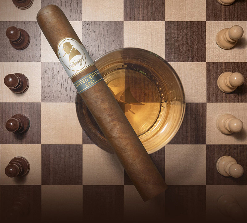 The Davidoff Winston Churchill Cigar 2021 with a whisky glass